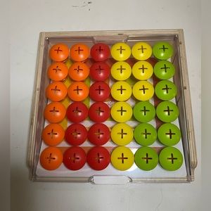 Lovevery Mosaic Button Board from “The Companion Play Kit”